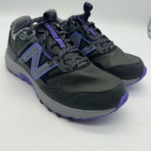 Woman’s New Balance 410v7 size 8 purple and grey/black